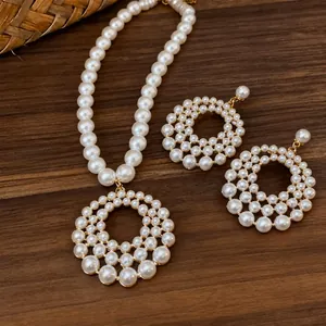 Elegant French style hollow circular pearl necklace and earrings jewelry set for women