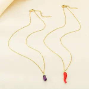 Gold stainless steel necklace with colorful enamel eggplant and chili pepper pendants