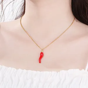 Summer dopamine red chili pepper pendant necklace in gold titanium steel on model