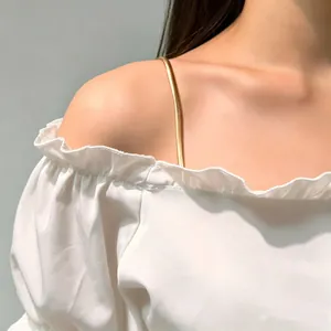 Elegant thin gold metallic bra shoulder strap body chain accessory for off-shoulder tops