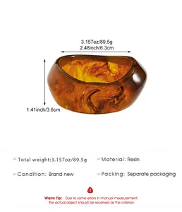 Detail view of retro marbled resin wide bangle with amber smoke pattern and dimensions