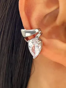 Detailed view of silver-toned twisted ear cuff with sparkling teardrop cubic zirconia
