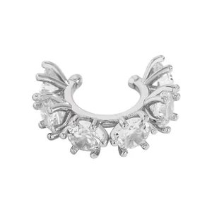 Detailed macro view of a silver-colored ear cuff with sparkling round cubic zirconia.