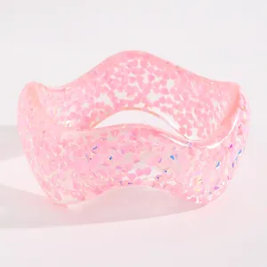 Vintage wide wavy pink resin bangle bracelet with chunky iridescent glitter flakes