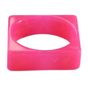 Detailed close-up view of a vintage pink marbled resin square bangle with smooth glossy finish