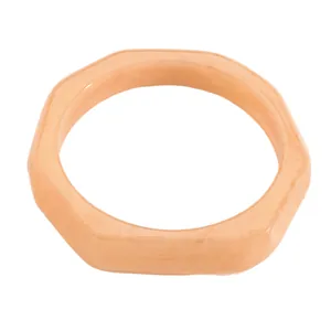 Detailed close-up view of a wide octagonal resin bangle with peach marbled texture