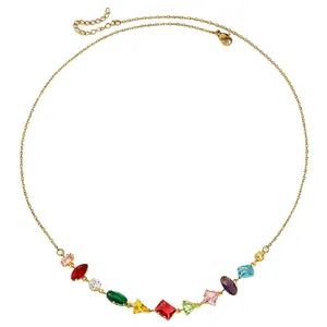 Detail macro view of multi-color gemstone necklace with gold-tone chain and zircons