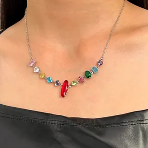 Macro view of multi-color cubic zirconia gemstone necklace showing vibrant colored stones