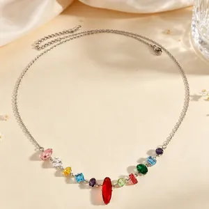 Elegant silver necklace with multi-colored gemstones and marquise cut center stone.