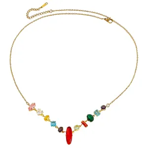 Detail view of a dainty gold necklace featuring multi-colored gemstones in various shapes