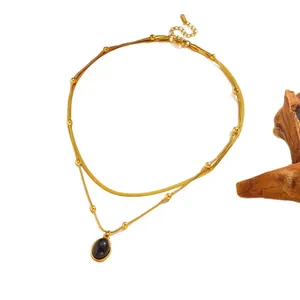 Collana a doppio strato in acciaio inossidabile dorato stile boho con pendente ovale