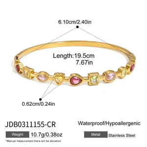 Close-up detail of gold stainless steel bracelet featuring colorful zircon stone charms