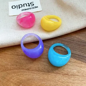 Vibrant acrylic marbled round rings set featuring candy colors for a fresh summer look