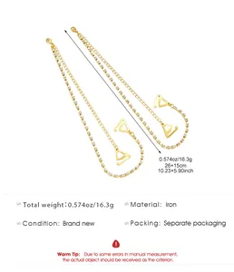 Detail view of gold rhinestone bra straps with precise size and weight information