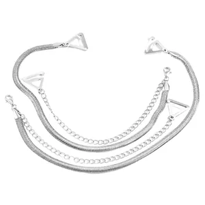 Detail view of silver metallic snake and link chain bra straps with hooks.
