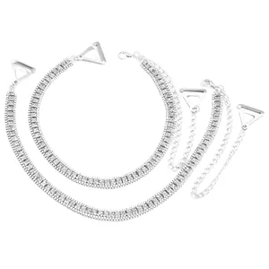 Detail of sparkling rhinestone bra straps with silver hooks for off-shoulder fashion styles