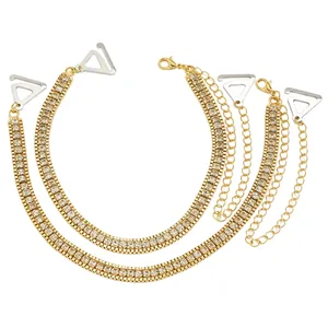 Detailed view of gold rhinestone bra straps with adjustable metal triangle hooks
