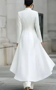 Elegant white high-neck suit set featuring a long top with flared hem, back view detail