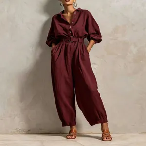 Full view of wine red V-neck buttoned jumpsuit with waist belt for casual wear