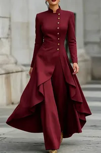 Close-up of elegant high collar and decorative gold buttons on a burgundy garment set
