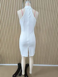 Back view of elegant white bodycon halter dress with a stylish back slit detail.
