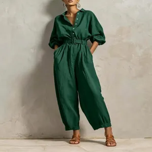 Full-length emerald green belted jumpsuit with button-down V-neck for women