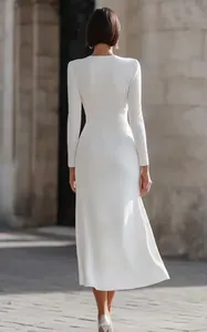 Back view of elegant white long sleeve maxi dress featuring a slim fit silhouette