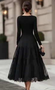 Back view of elegant French Hepburn style black long sleeve midi dress with mesh skirt