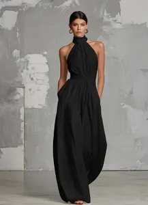 Detailed view of an elegant black halter neck wide-leg jumpsuit for women