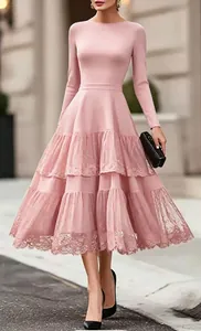 Elegant pink long-sleeve midi dress featuring a tiered lace mesh skirt and a round neckline.