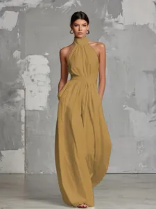 Elegant mustard yellow halter neck backless wide-leg jumpsuit for women detail view