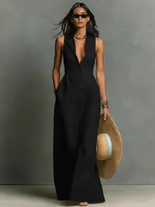 Chic sleeveless button-down maxi dress in black featuring a classic shirt collar detail