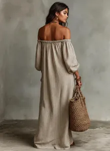 Back view of a striped off-shoulder maxi dress featuring elegant puff sleeves and a flowing hem