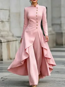 Elegant French high-neck trouser skirt set in light pink with ruffled high-low hem