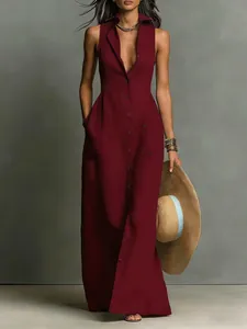 Detail of a burgundy sleeveless maxi shirt dress with elegant button-down front design