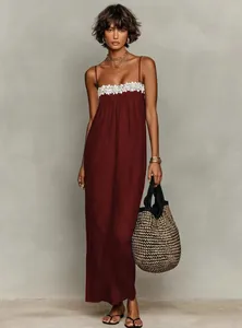 Elegant burgundy summer maxi dress with white floral lace bust trim and slim spaghetti straps