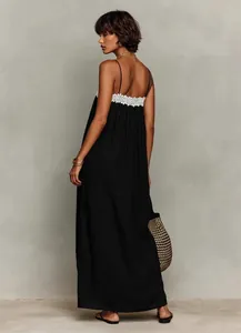 Elegant black sleeveless maxi dress with white lace trim for premium summer holidays