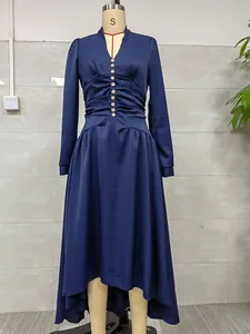 Elegant navy blue long sleeve V-neck dress with ruched waist on mannequin