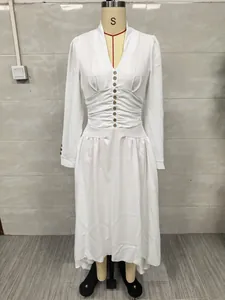 Front detail of an elegant white V-neck dress with button-front and ruched waist design