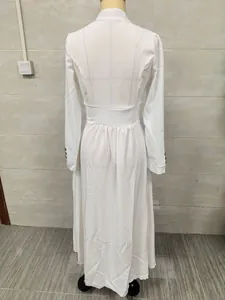Back view of an elegant white long-sleeve maxi dress with a cinched waist details.