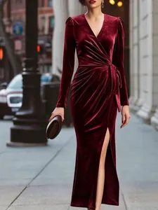 Elegant burgundy V-neck long sleeve velvet maxi dress with a side tie and sexy high slit
