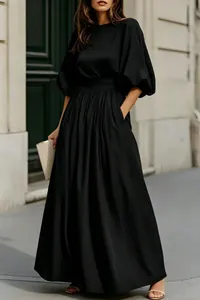 Elegante abito lungo nero stile francese con maniche a sbuffo e vita attillata