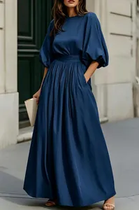Elegante abito lungo francese blu navy con maniche a lanterna e vita stretta