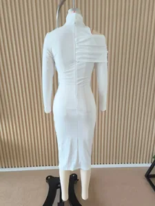 Detailed back view of an elegant white off-shoulder slim-fit midi dress with pleats