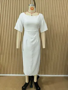 Detailed view of an elegant white midi dress featuring a round neck and stylish elbow sleeves