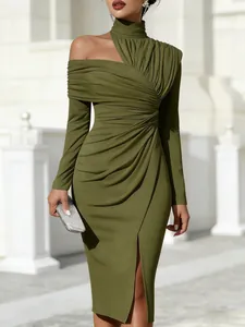 Detailed shot of olive green off-shoulder dress featuring elegant pleated draping and a slit