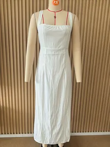 Elegant white slim fit bandeau sleeveless maxi dress on display mannequin