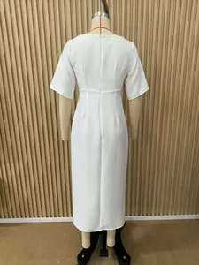 Detailed back view of an elegant white round neck midi dress displayed on a mannequin