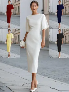 Elegant boat neck midi dress with short bell sleeves available in five classic colors