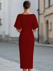 Back view of elegant burgundy midi dress with half sleeves in urban street setting